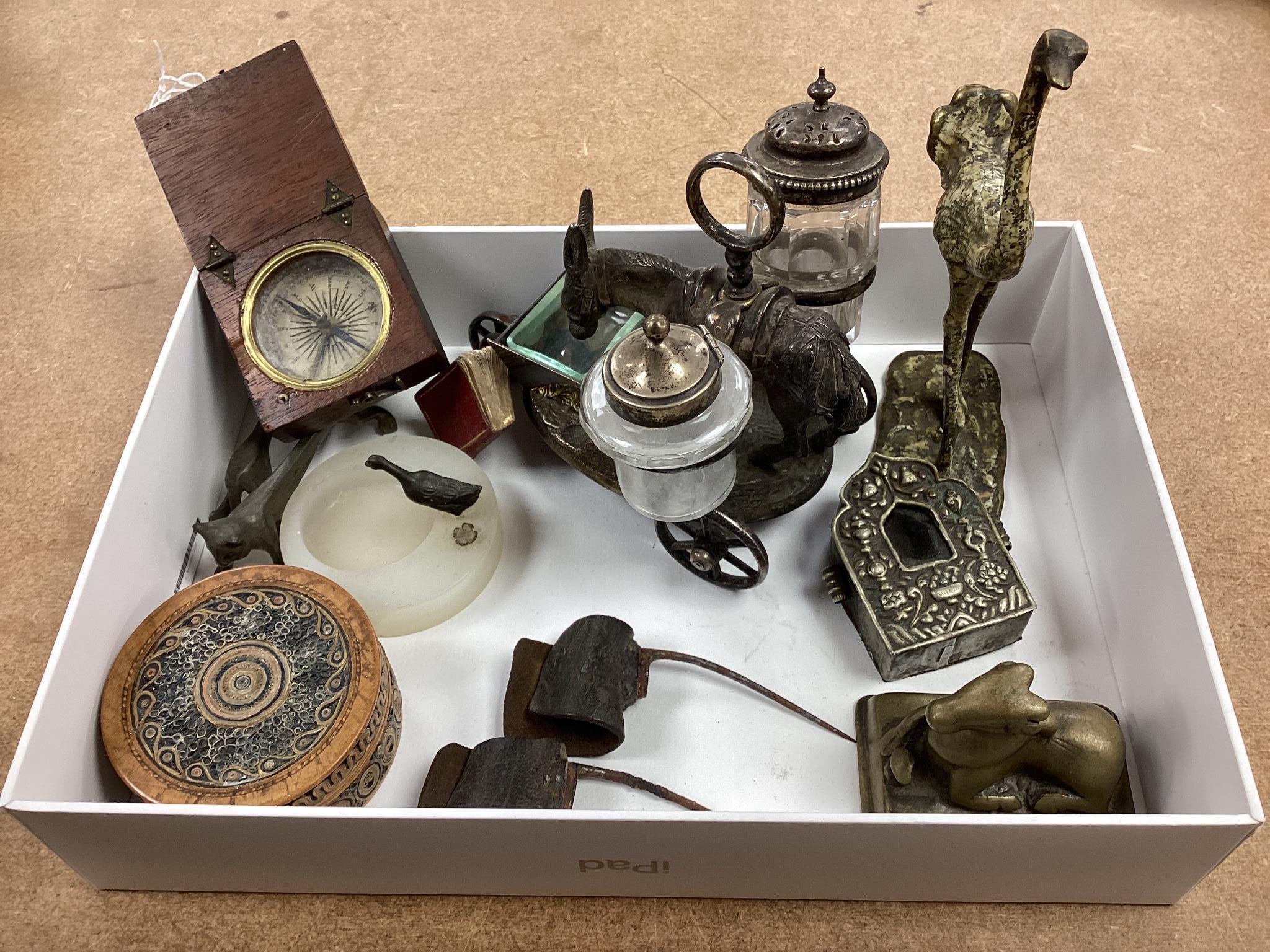 A selection of various miscellaneous items, to include a pair of 19th century cock fighting spurs, a rolled paperwork circular box and cover, a novelty plated donkey cruet, Tibetan box etc.